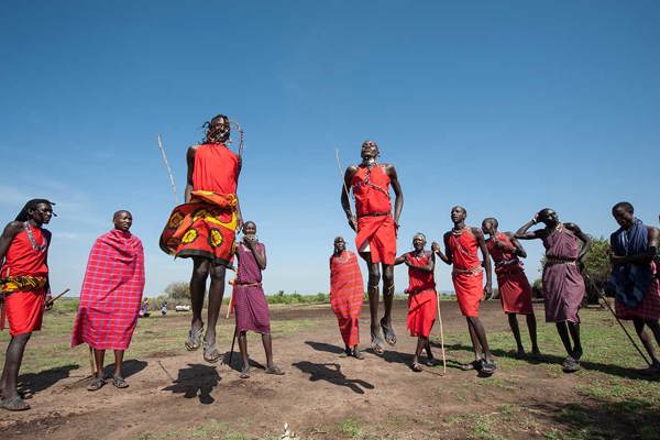 group of maasai warriors jumping meet the maasai on your safari to Kenya #best ©bushtreksafaris