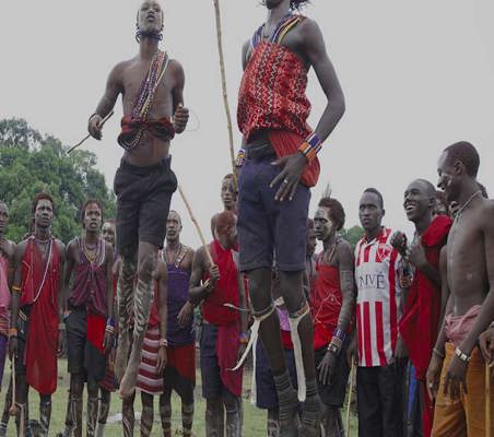 Masai Jump for tourists #2 while on safari in Kenya maasai mara organised by ©bushtreksafaris private safaris