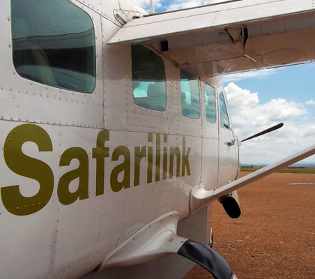 Safarilink caravan aircraft on maasai mara runway ®bushtreksafaris