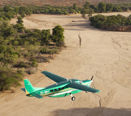 flying safaris in africa ®bushtreksafaris safe & secure 20 seater caravan aircraft