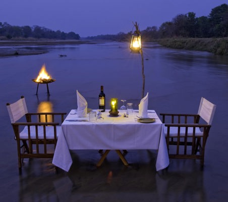 bush dinner for two on shallow water flats on honeymoon safari ®bushtreksafaris